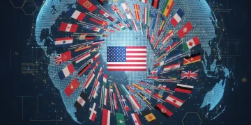 Flags of NATO member nations with a prominent US flag, representing collective defense and leadership.